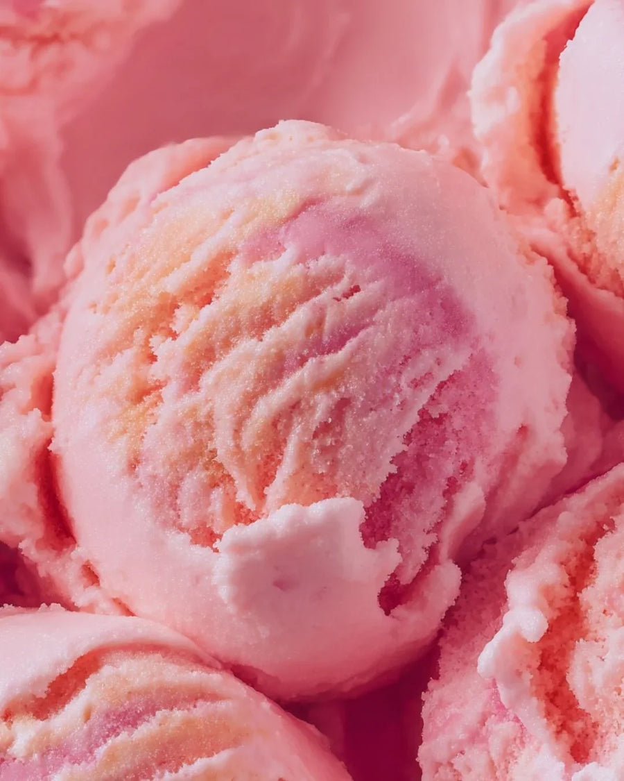 Pink ice cream scoops with swirled texture, close-up, dessert food photography