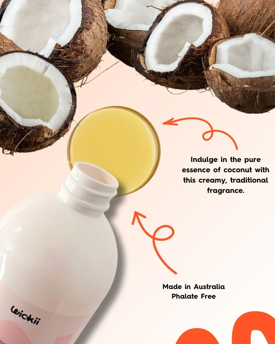 Coconut fragrance oil bottle with open cap, surrounded by fresh coconut halves, creamy oil.
