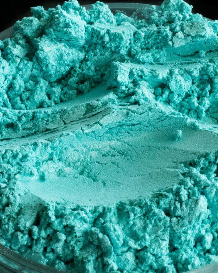 Bright turquoise powder pigment, perfect for candle making and soap colorant crafts.