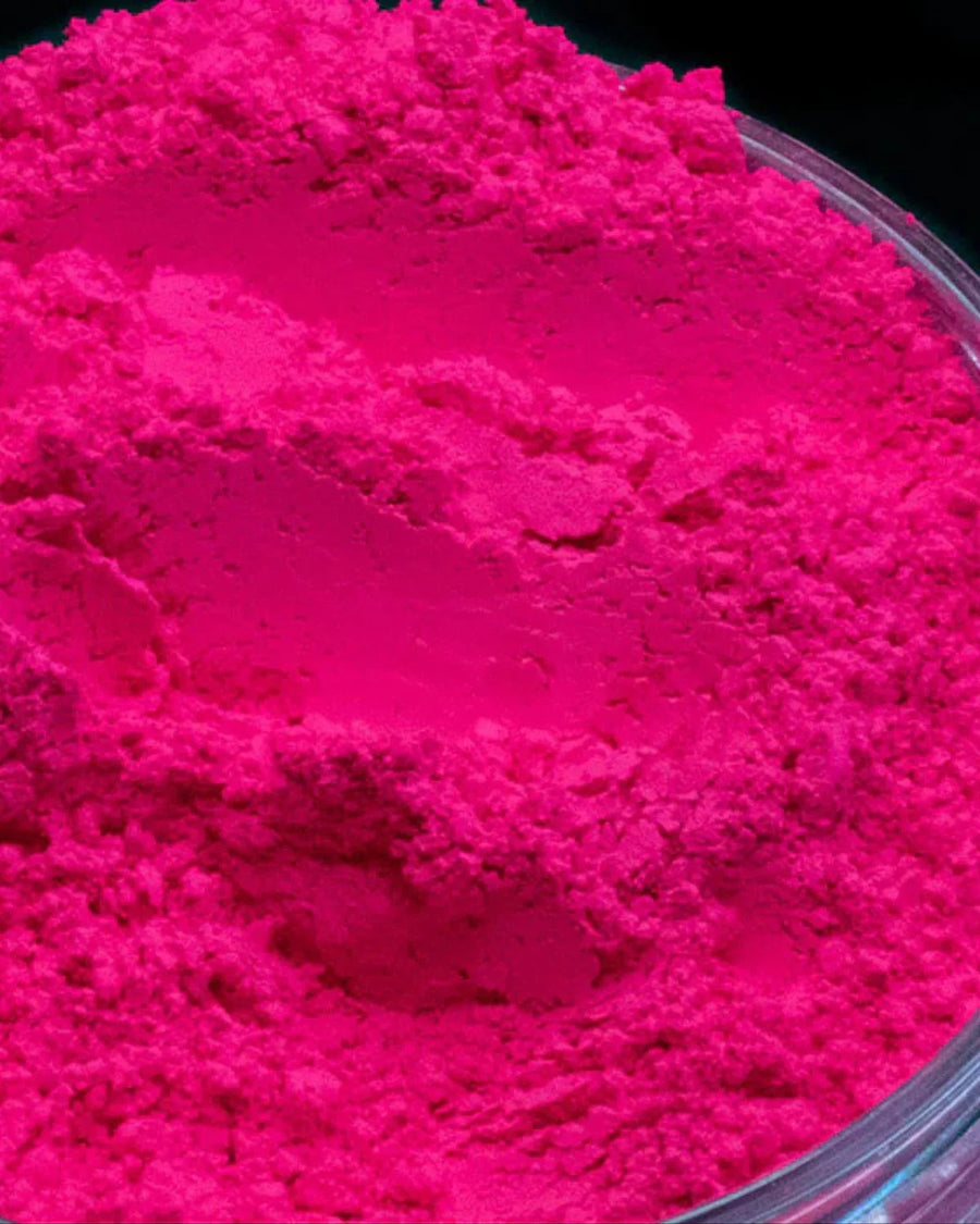 Bright pink candle making mica powder in a clear container, perfect for soap and crafts