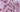 Pink wax melt bars for candle making supplies, close-up pile with textured surface