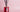 Red glass reed diffuser bottle labeled 'Musk Edit' with black reeds on a pink background