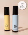 Two essential oil roller bottles with minimalist yellow and blue labels for DIY fragrance.