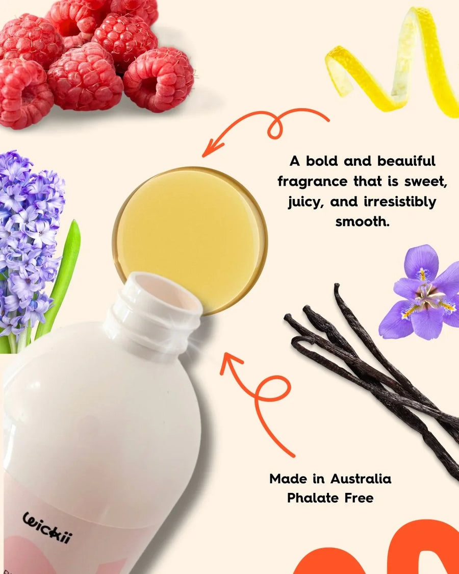 Fragrance oil bottle with raspberry, lemon, vanilla, hyacinth, and iris accents.