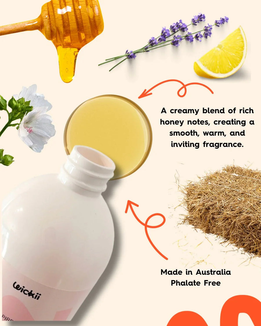 Fragrance oil bottle with honey, lavender, lemon, white flower, and hay, promoting warm scent.