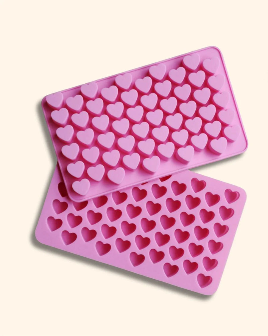 Pink silicone heart mold tray for candle, soap, or wax melt making supplies