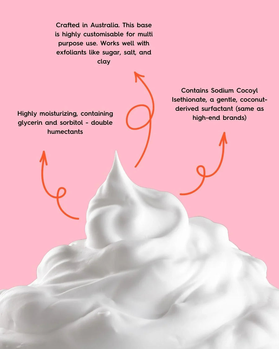 Creamy white whipped soap base on pink background with product benefit text overlays.