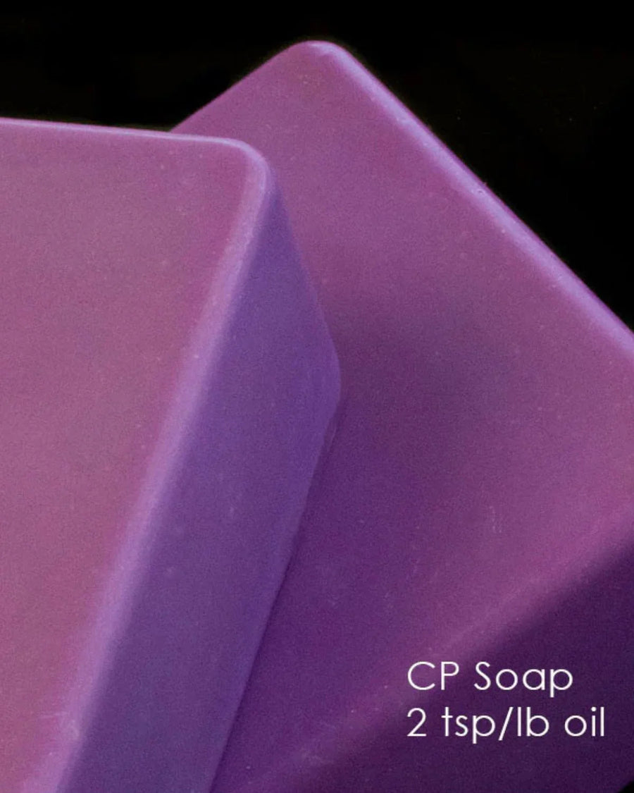 Close-up of two purple cold process soap bars with text 'CP Soap 2 tsp/lb oil'.