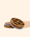 Round bamboo diffuser vent clips with geometric cutout design on a neutral background