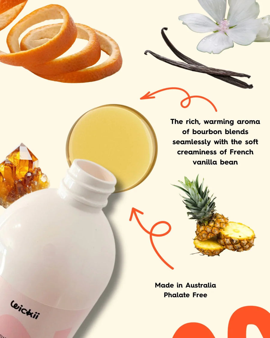 Fragrance oil bottle with orange peel, vanilla bean, pineapple, crystals, and text highlights.