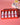 Box set of five fragrance oils in fruity scents for candle making, displayed on a pink background.