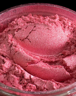 Close-up of shimmering pink mica powder pigment for candle or soap making